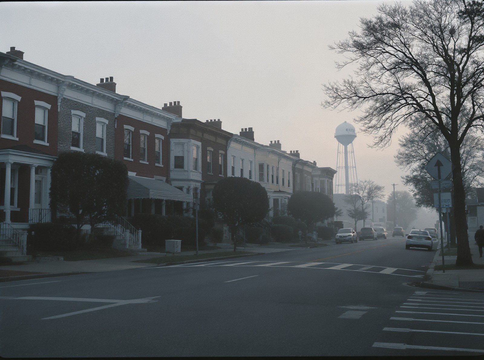 Quiet Philadelphia rowhouse street corner in early morning light