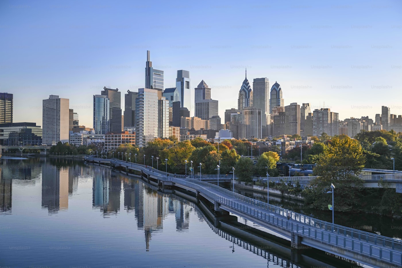 Philadelphia skyline reflected in the Schuylkill River at golden hour