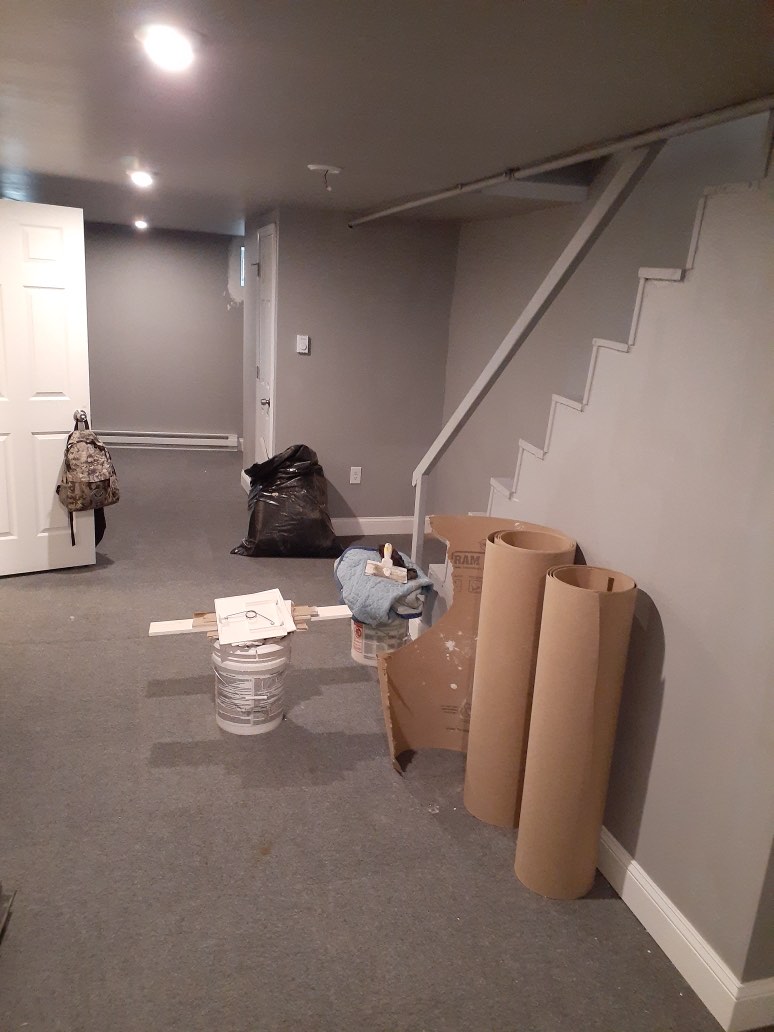 Mid-renovation stairwell and staging area inside the 1526 S Vogdes St renovation
